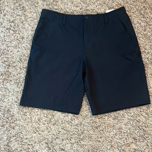 Boys Under Armour black golf shorts. Size XL. Adjustable waistband. Like new.
